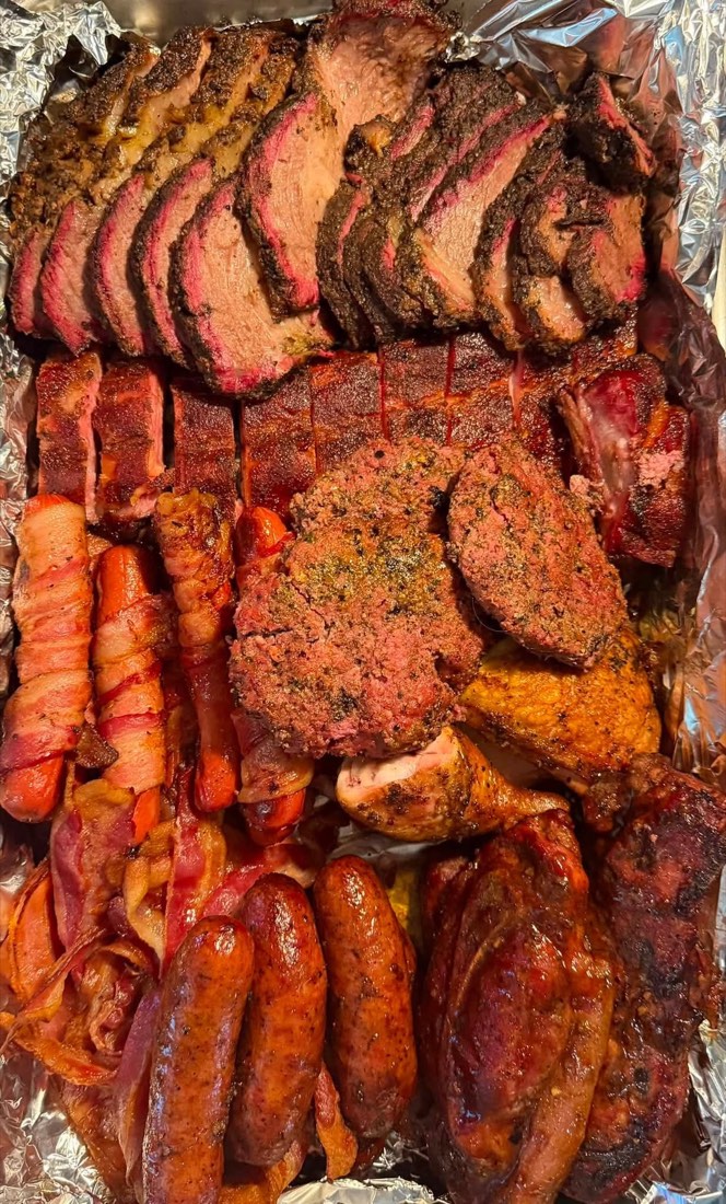 Barbecue plate with smoked meats and homestyle sides