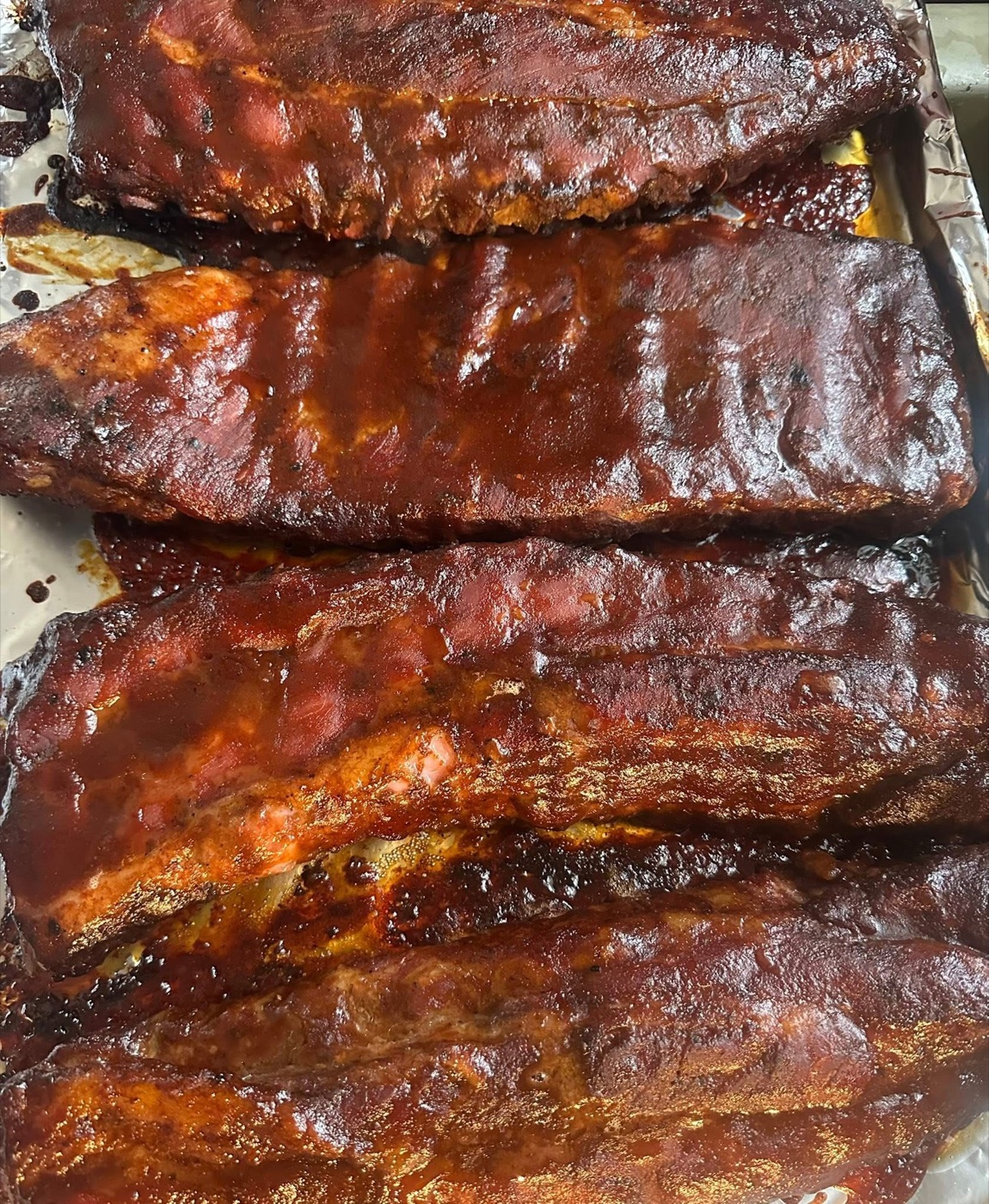 R&R Catering's glazed Texas BBQ ribs prepared for a catered event