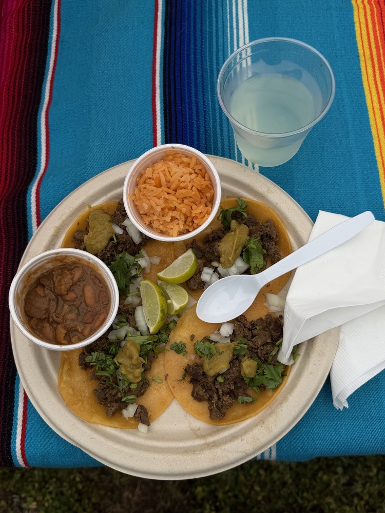 Tex-Mex tacos served with beans and Spanish rice
